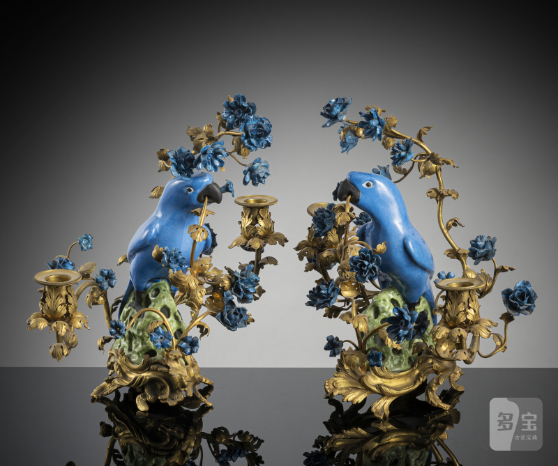 A pair of parrots as candle holders with magnificent mounting